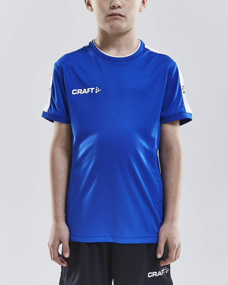 Progress Practise Tee Jr von Craft – Royal Blue
